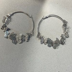 Silver butterfly hoops